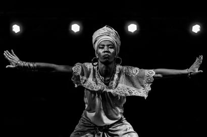 African American woman dancing on stage